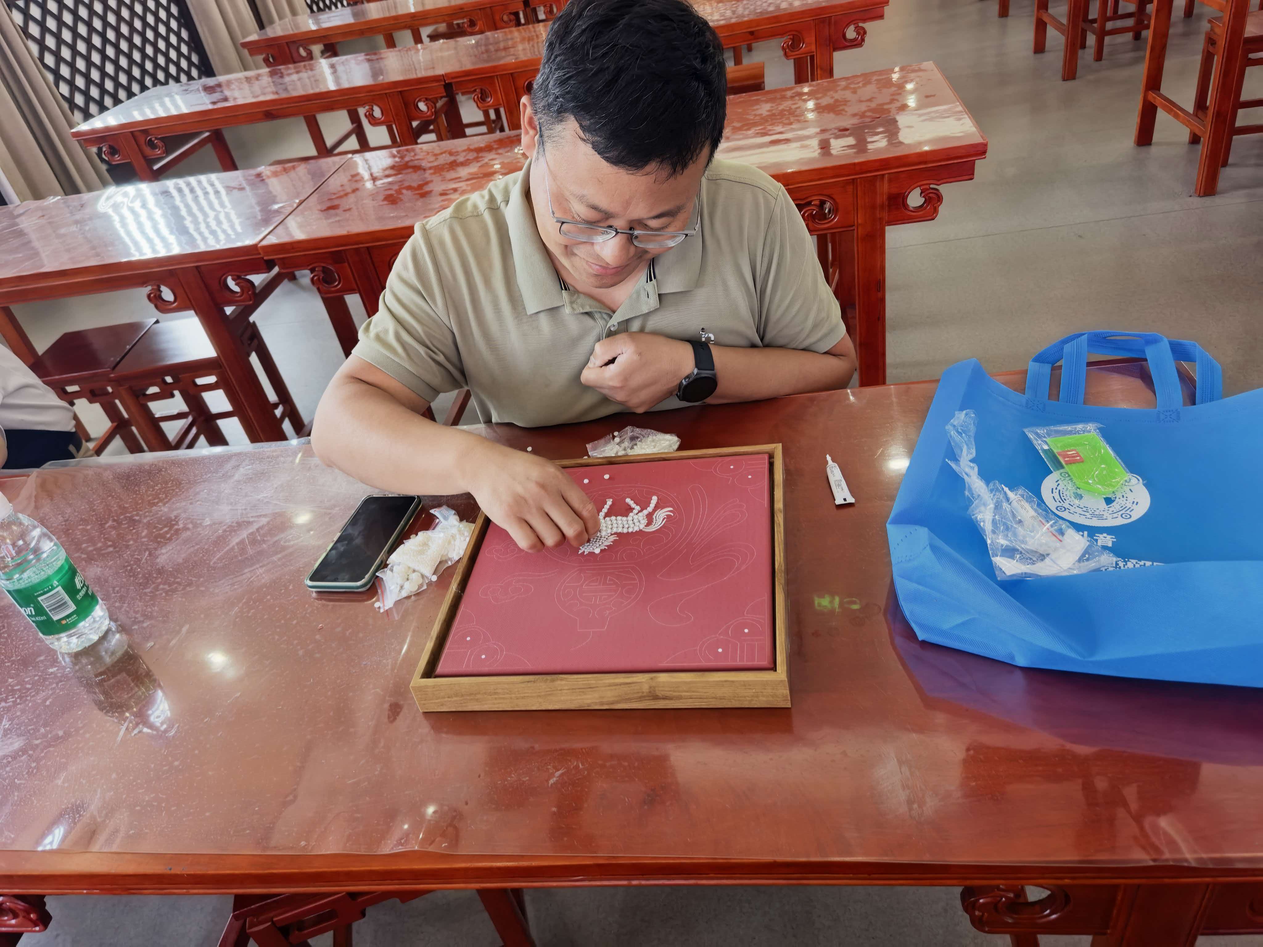 1784084037594192.jpg 2026.7.13唐城寻文脉 实干践同心——扬州市新华中学民进、民盟支部走进唐子城景区3.jpg